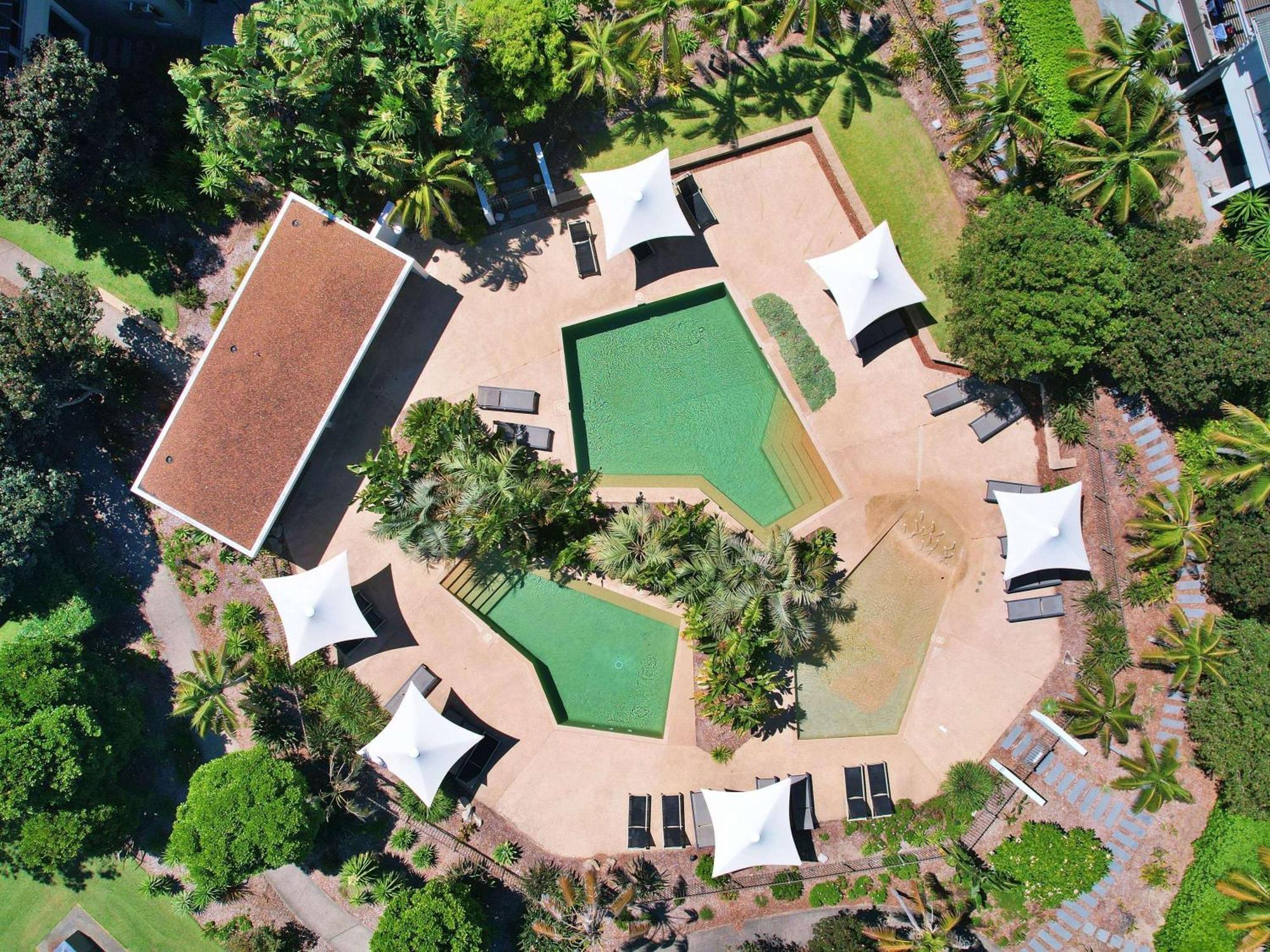 Pullman Magenta Shores Resort Entrance Exteriör bild Aerial view of the resort